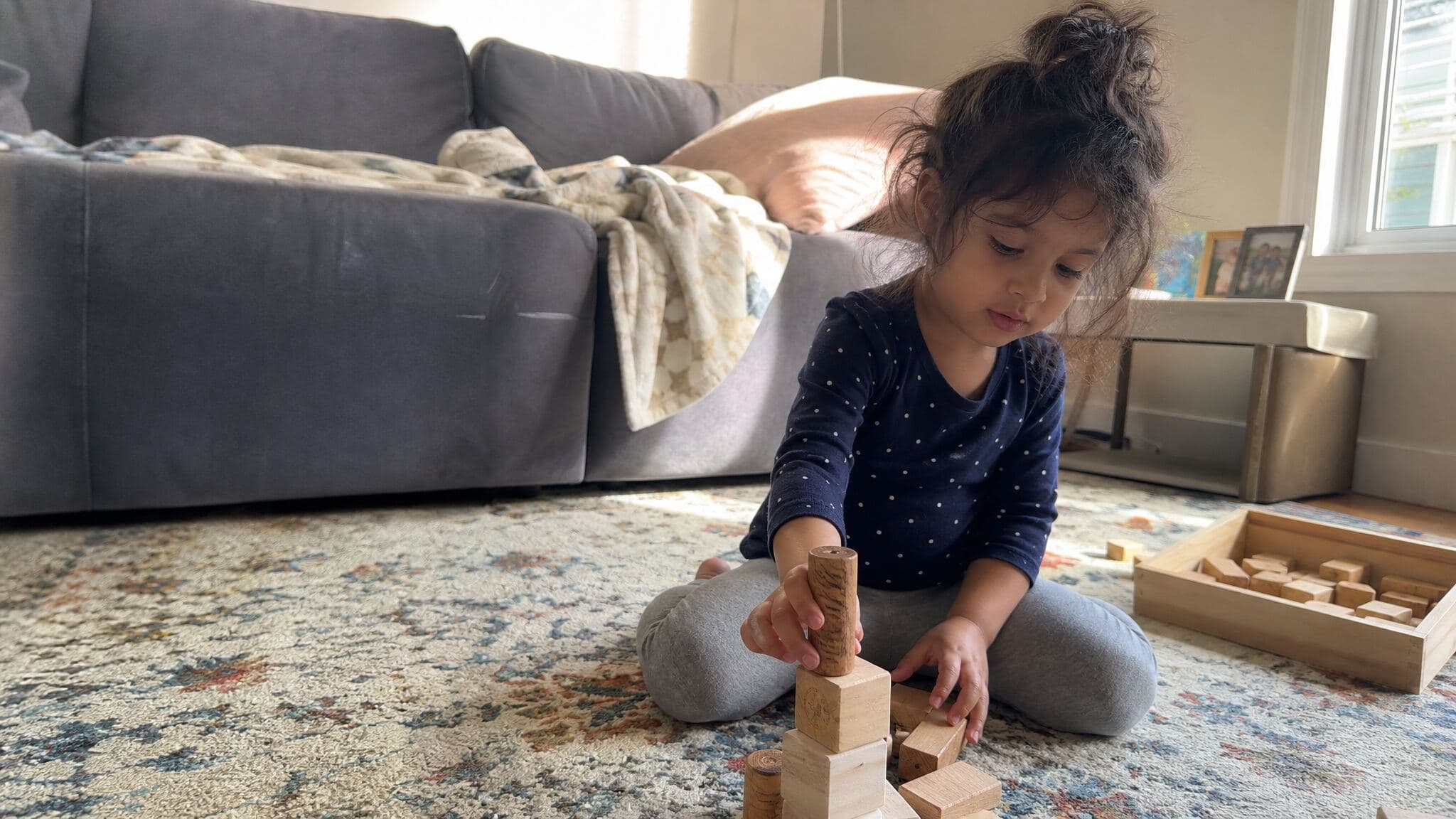 A preschooler doing quiet activities in the afternoon instead of napping